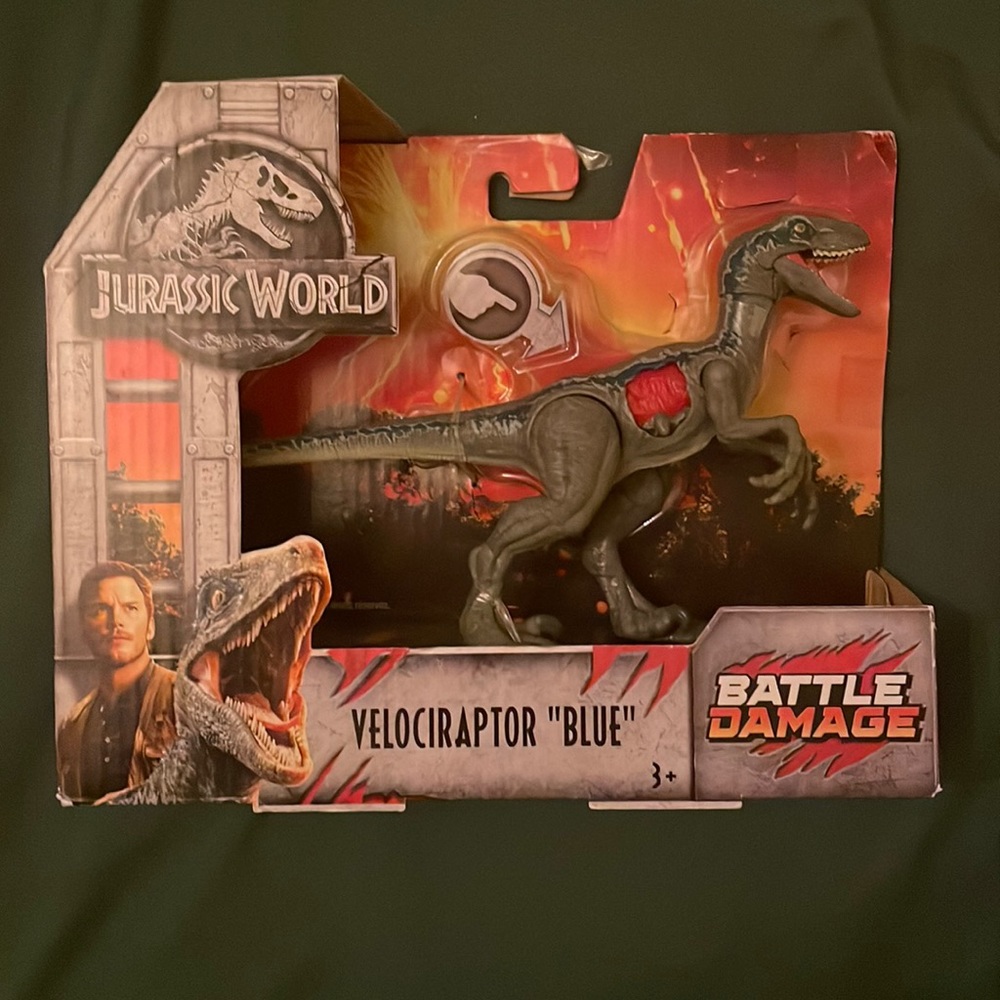 NIB Jurassic World Battle Damage Velociraptor “BLUE”
